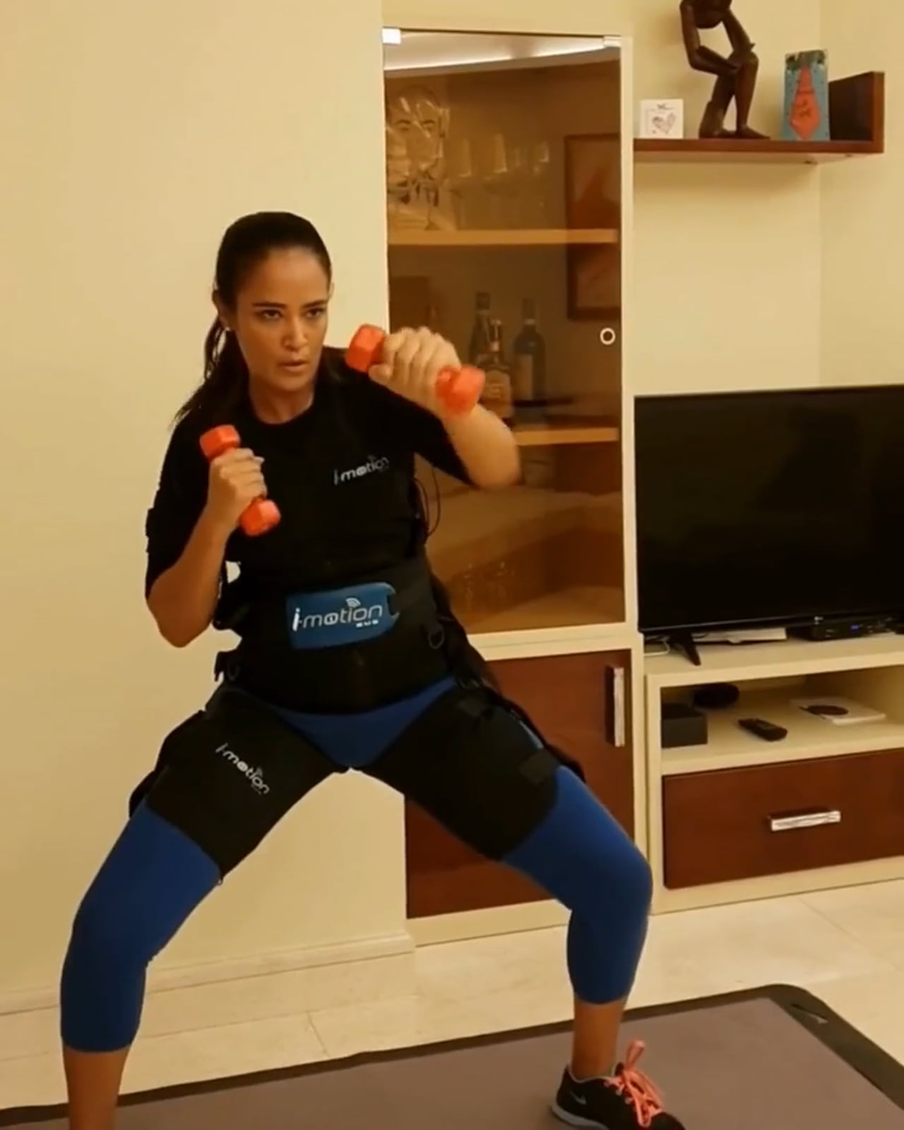 EMS training in Dubai, a full body session in action with a certified coach