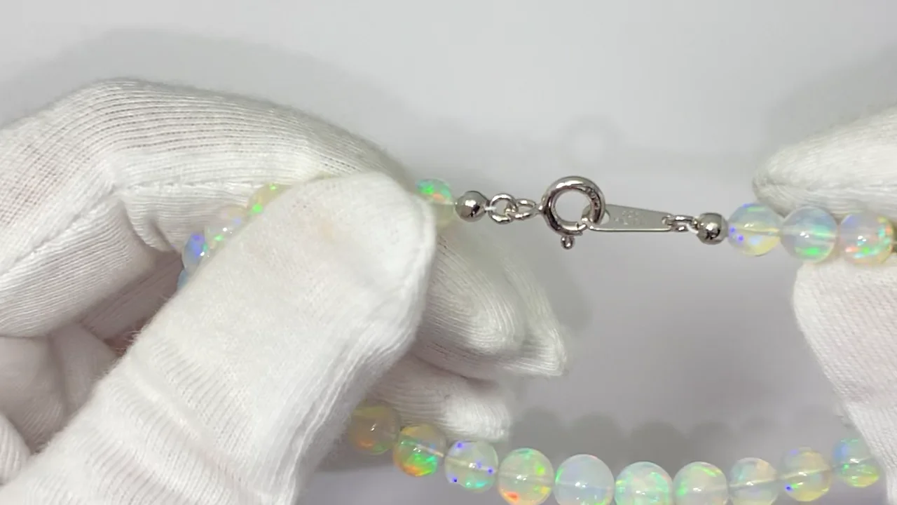 宝石質エチオピア産オパール AAA セミラウンド5~6.5mm 1連