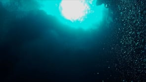 0857_Air bubbles in slow motion passing through underwater cavern