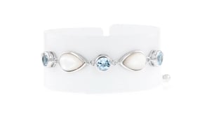 Mother-of-Pearl and 6.00 ct. t.w. Sky Blue Topaz Bolo Bracelet in Sterling Silver