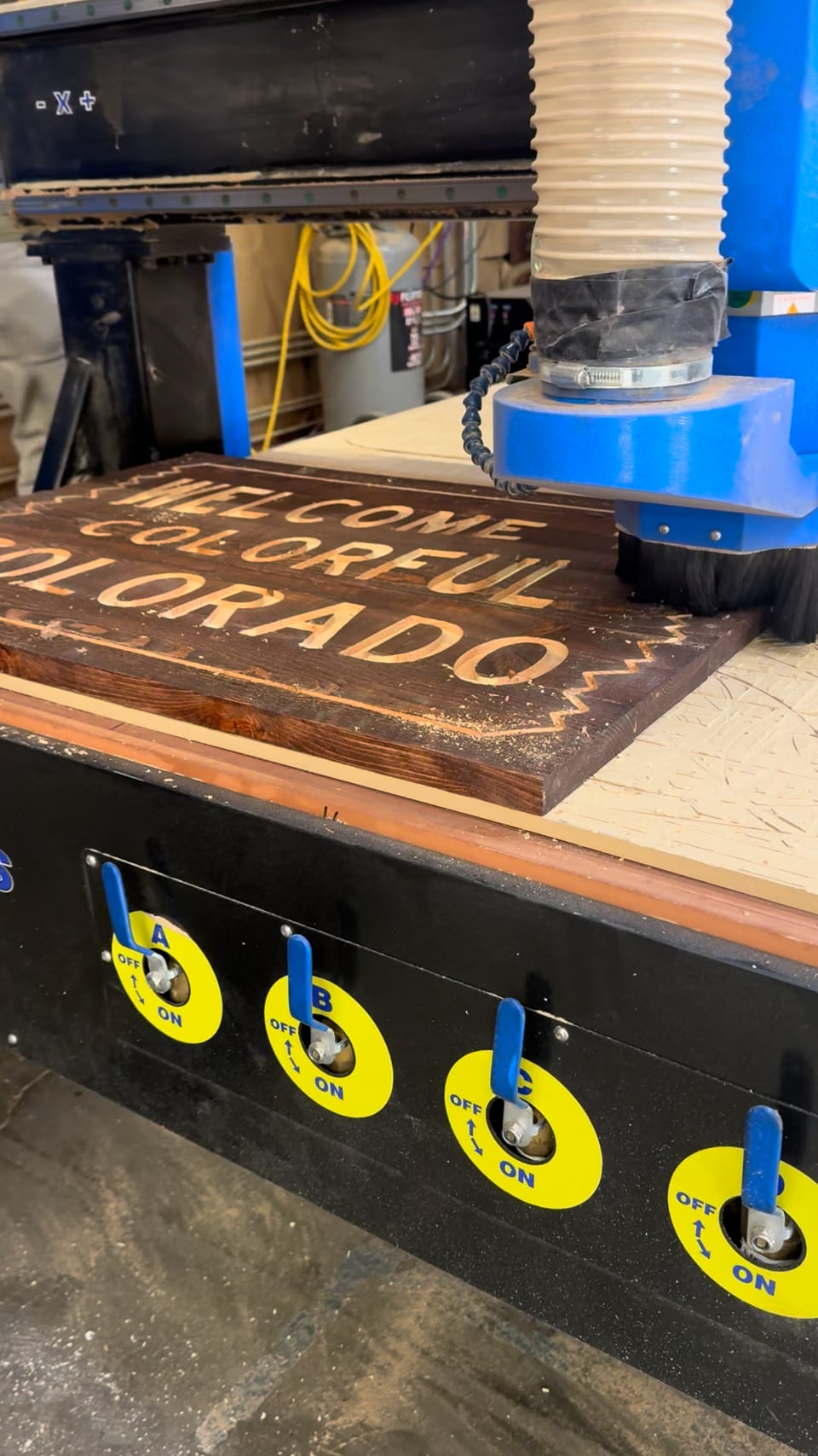 Watch: carving the Welcome to Colorful Colorado sign