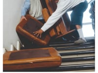 Heavy Furniture Stuck in Doorway, Customer Struggling