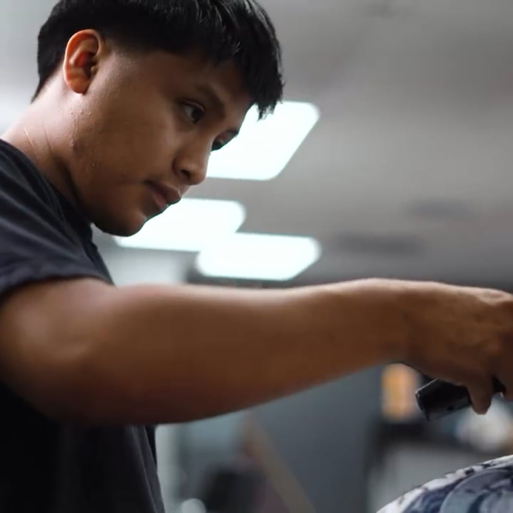 Faders barber cutting hair — fade and lineup work at Faders Barber Studio Largo FL