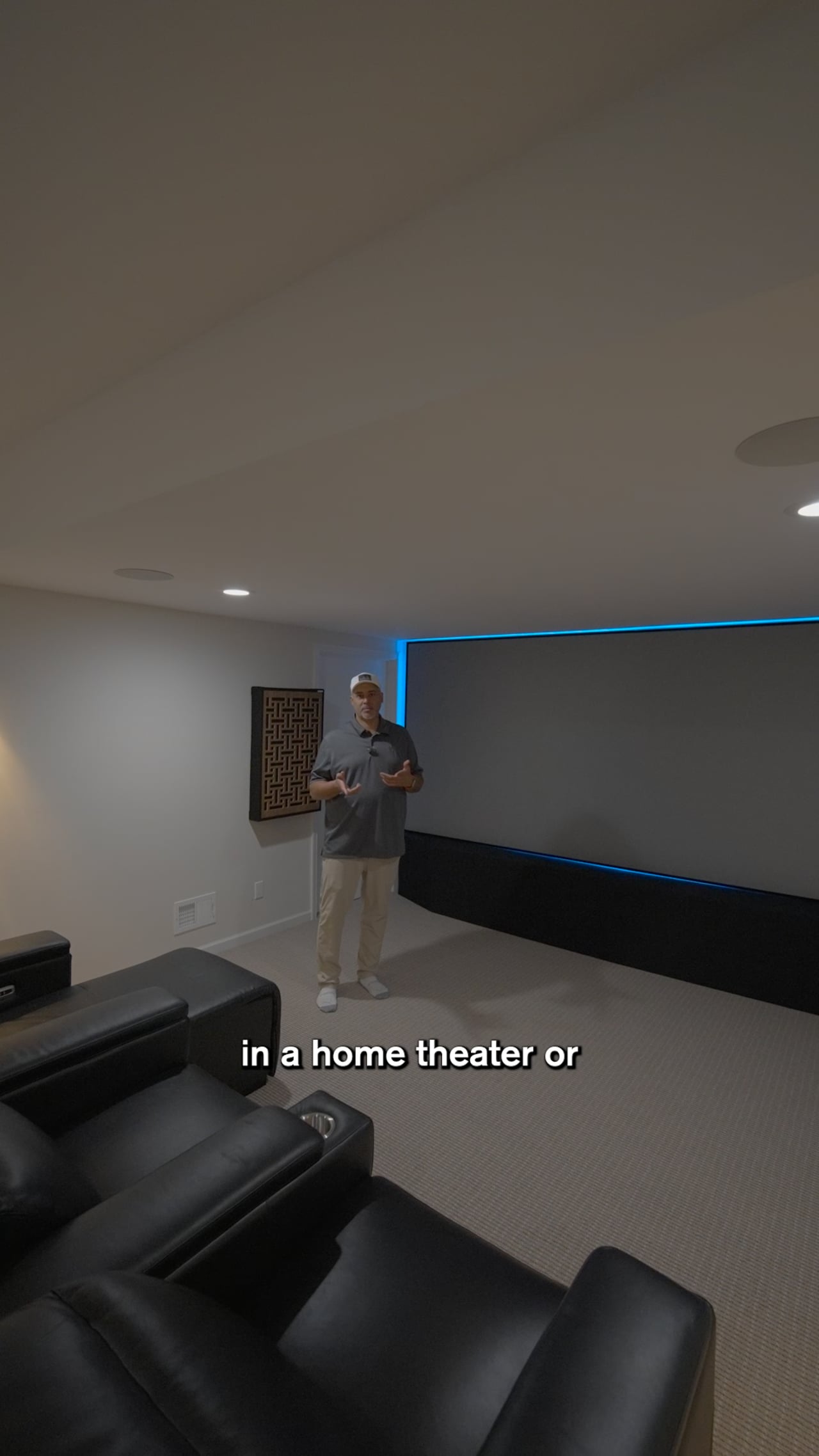 Jonathon Anderson, founder of The Sound Vision, in a client home theater