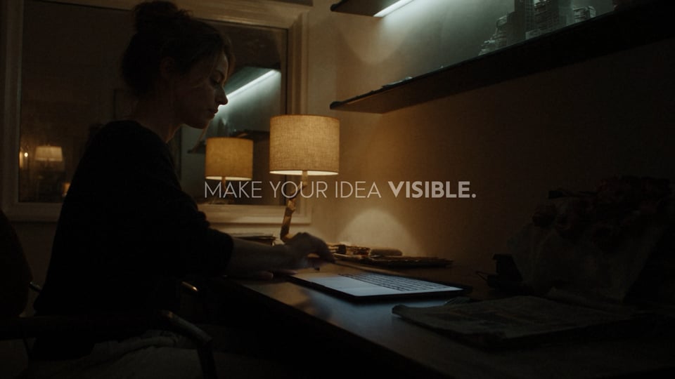 architect using an ai rendering platform on a laptop in a saas product video