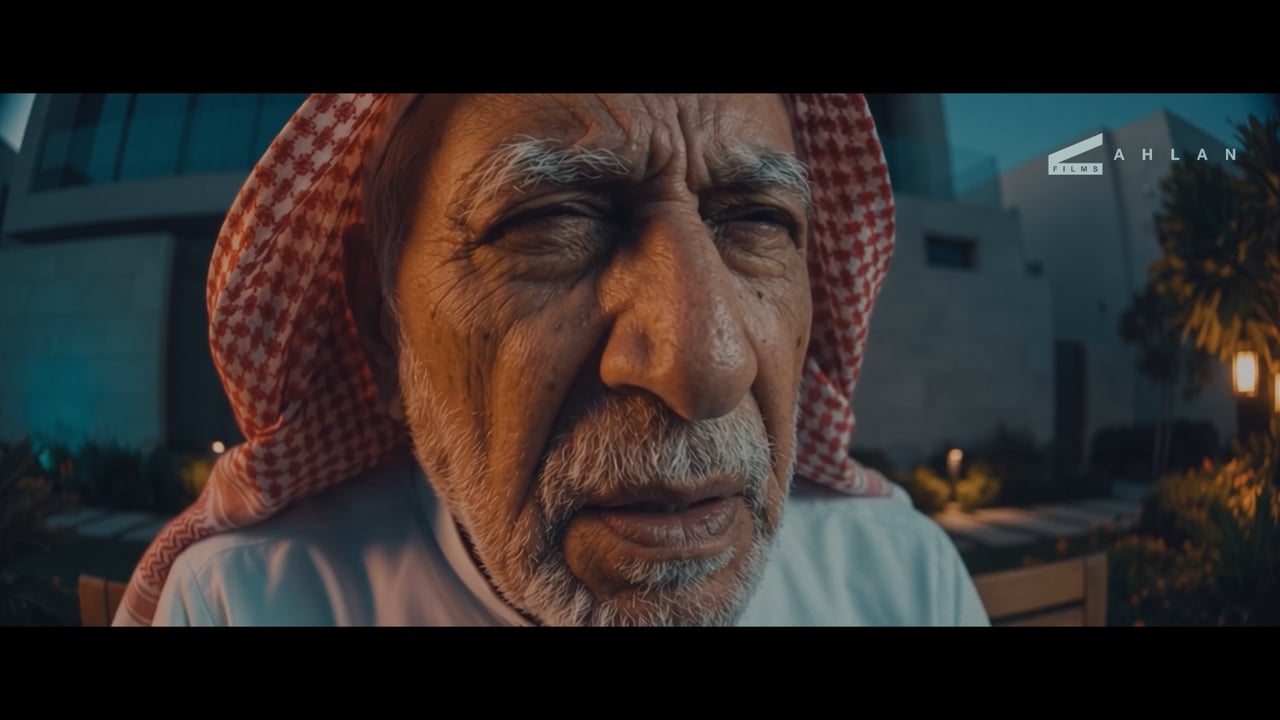 Elderly Saudi man in a red shemagh, still from the Ahlan Films Saudi National Day 2026 film