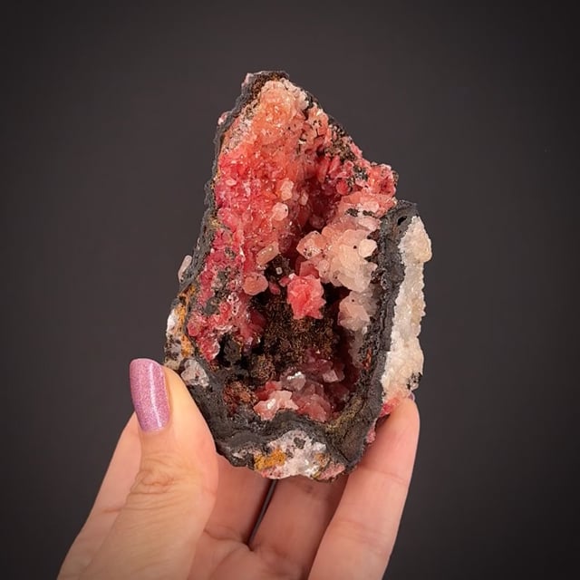 Calcite included by Cuprite var. Chalcotrichite