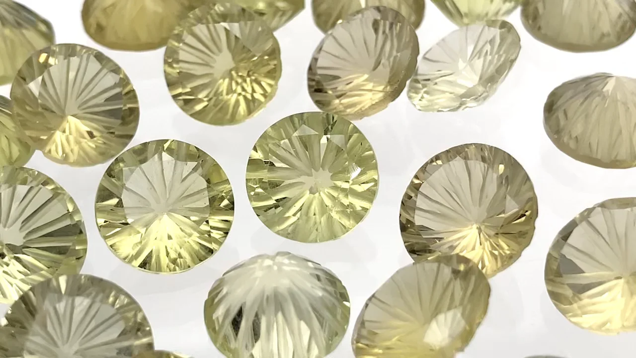 宝石質レモンクォーツAAA 彫刻入りラウンドファセットカット12×12mm 1