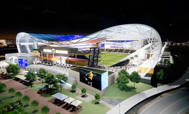 3D rendering of the proposed CT United soccer stadium lit at night on the Bridgeport waterfront