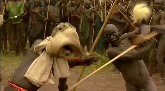 Children making a donga stick fighting i, Stock Video