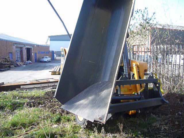 Side Tip Bucket Skid steer loader on Vimeo