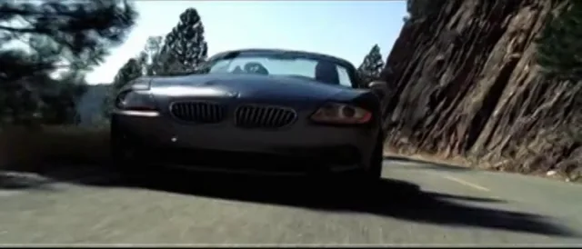 Реклама bmw с мадонной и клайвом оуэном