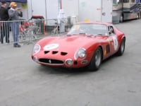 Ferrari GTO’s exiting the track at Laguna Seca during the Monterey Motorsport Reunion, 2011.