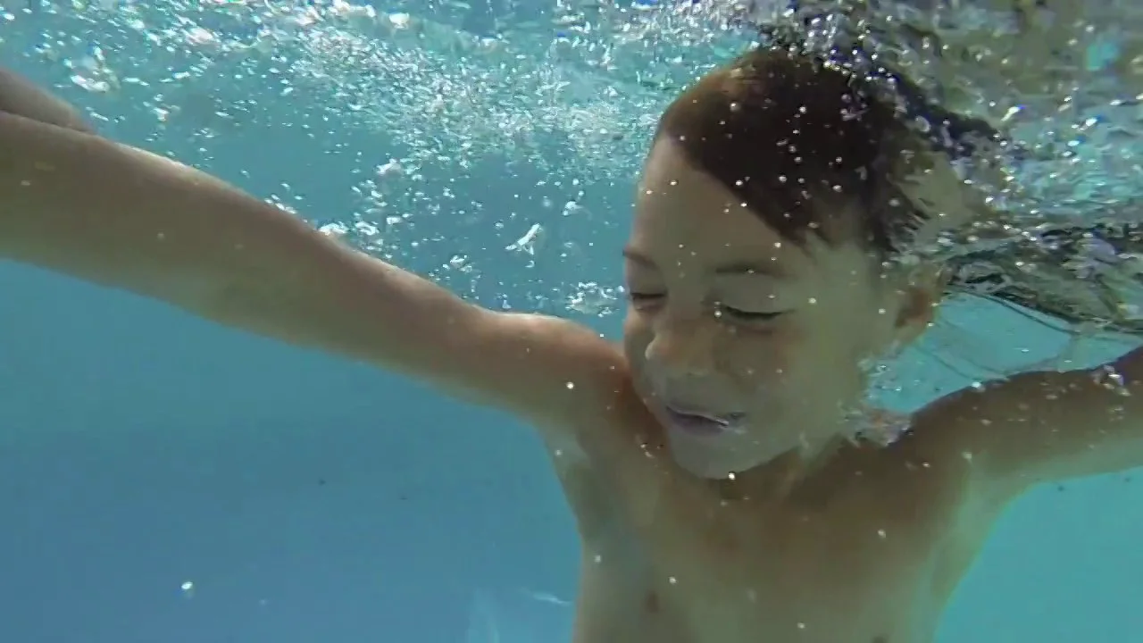 Afternoon swimming-pool in family