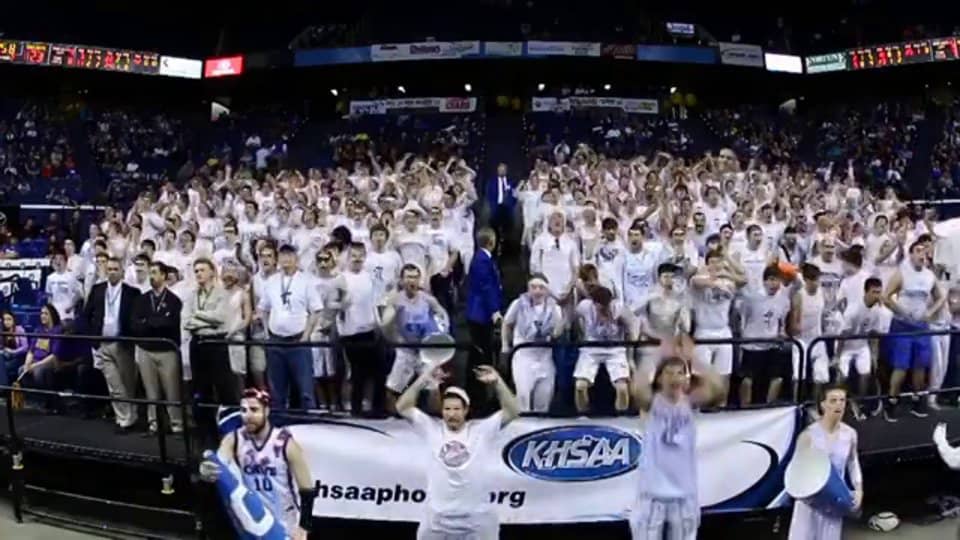 The Covington Crazies cheering section cheer its team to the school's