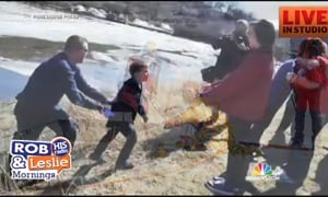 Rescuers Save Boys From Frozen River
