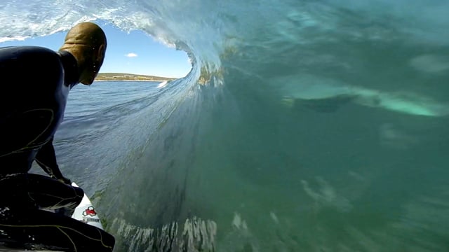 GoPro: Kelly Slater and Dolphins Surf The Box from GoPro
