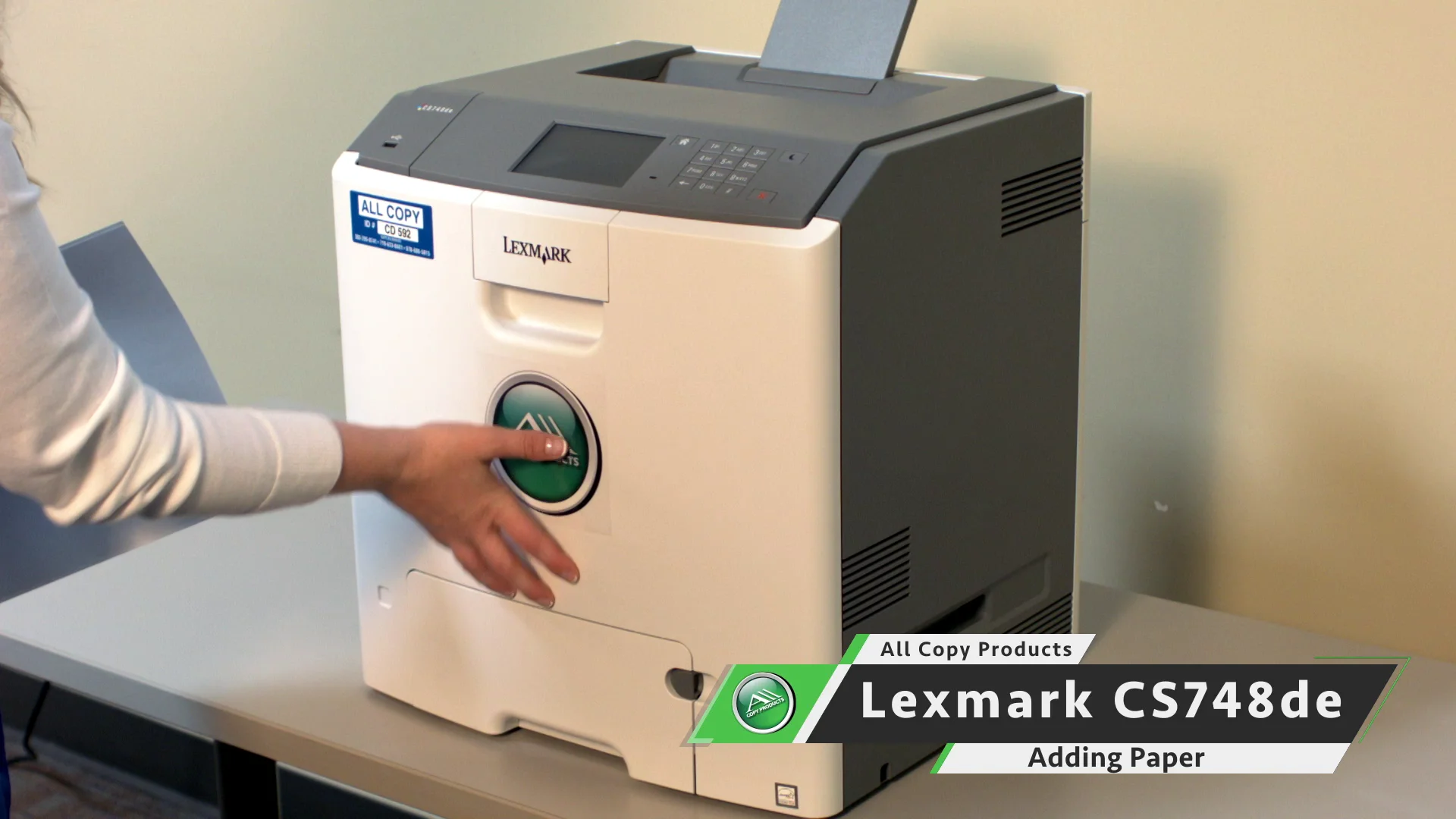 Lexmark CS748deAdding Paper on Vimeo