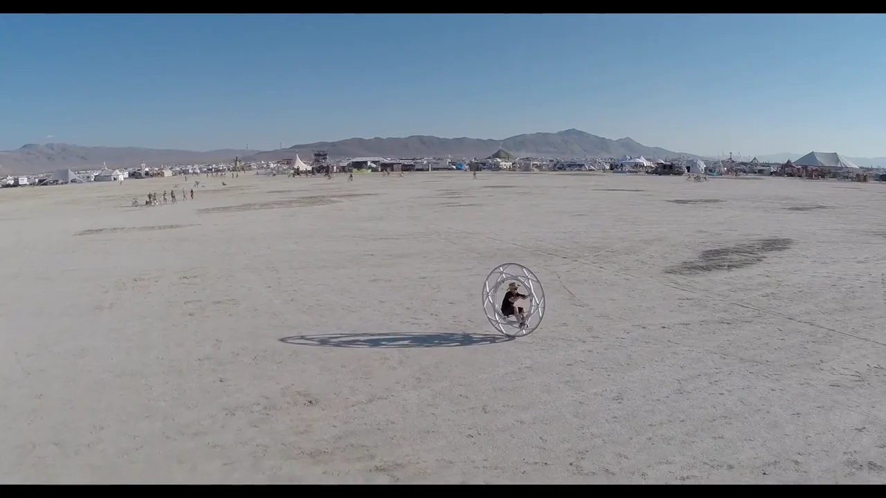 Cary Frame rides his monowheel at Burning Man 2014 on Vimeo