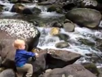 Young boy fly fishing