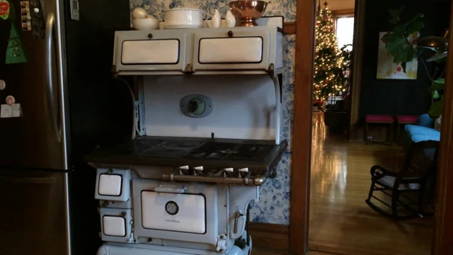 Antique Elmira Stove Works wood cook stove with six burners, plus warming  oven, hot water reservoir.