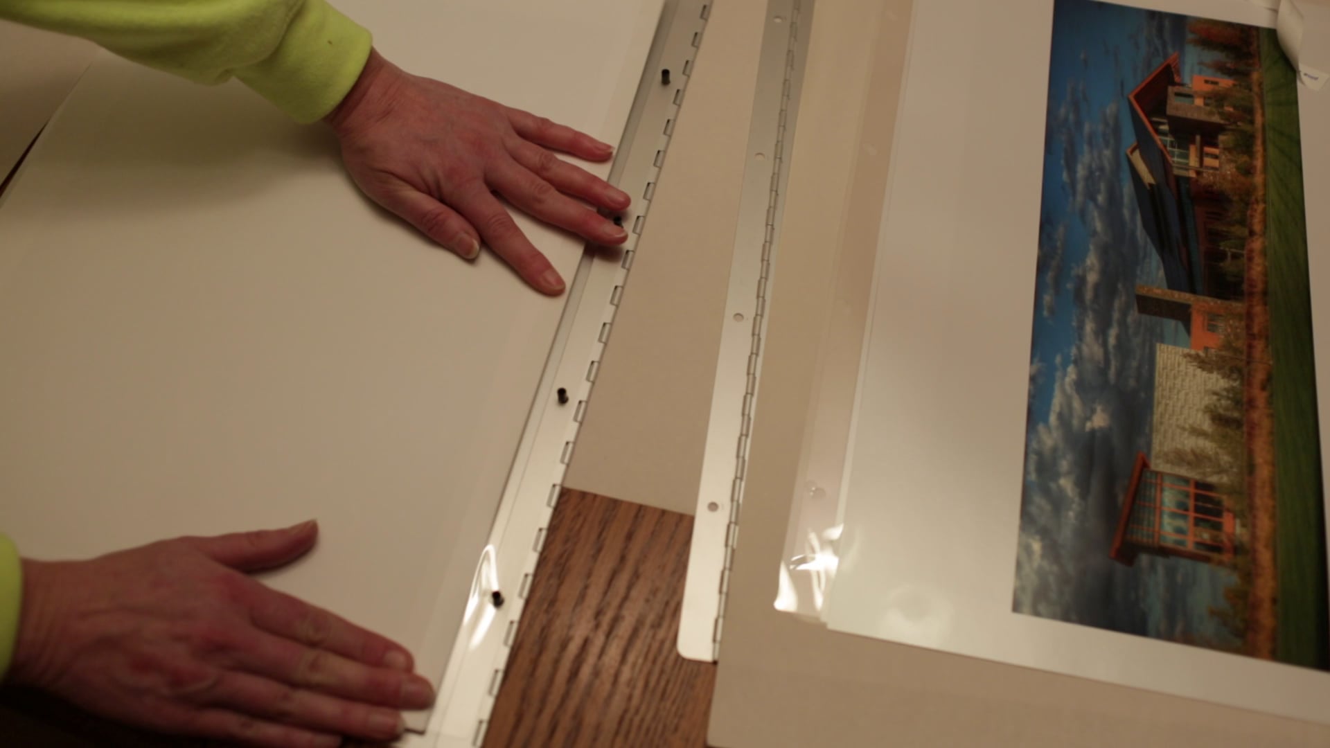 Applying Adhesive Hinge Strips in a Portfolio on Vimeo