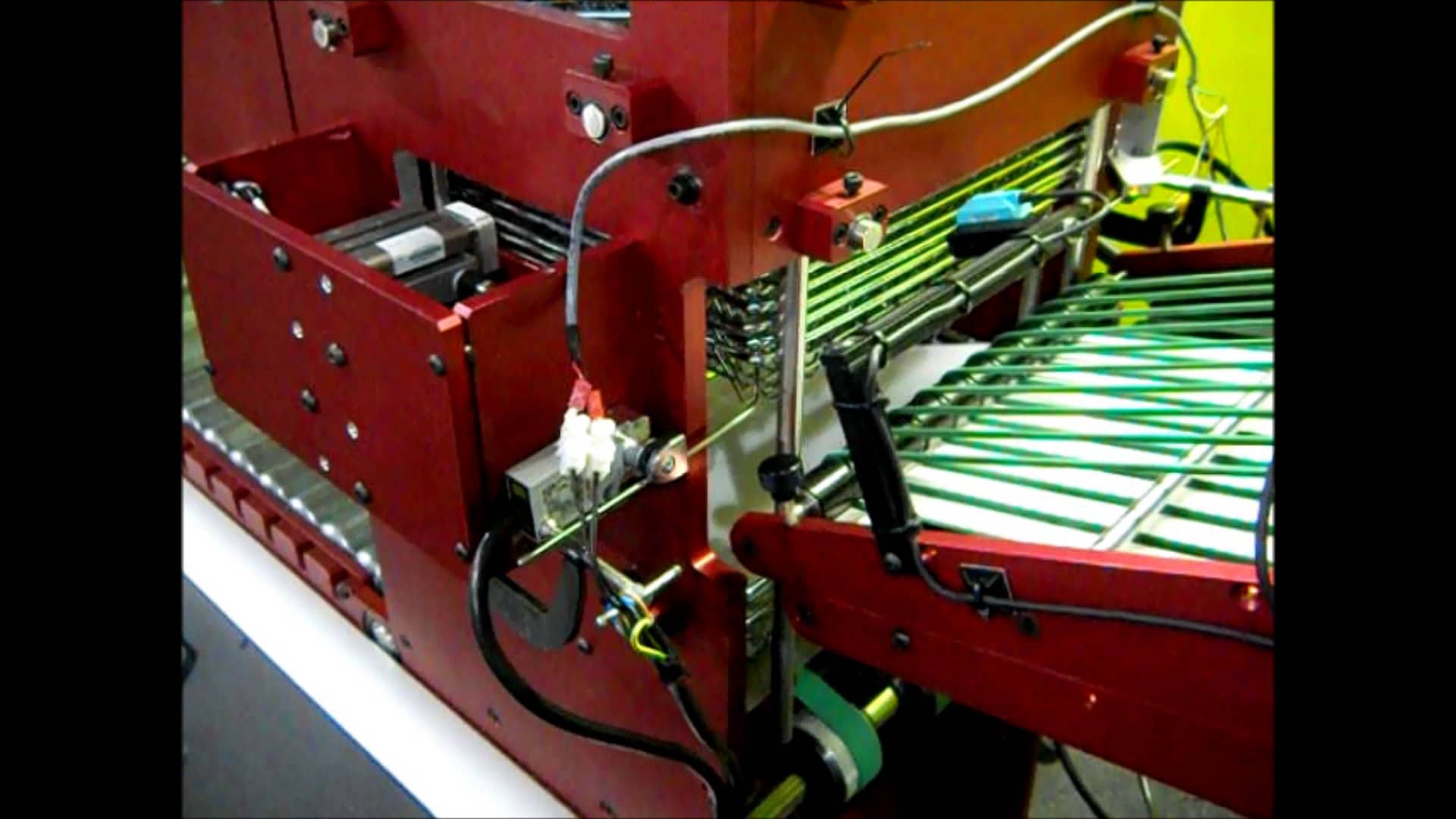 Metal Tray denester with wax paper feeding and stacking on Vimeo