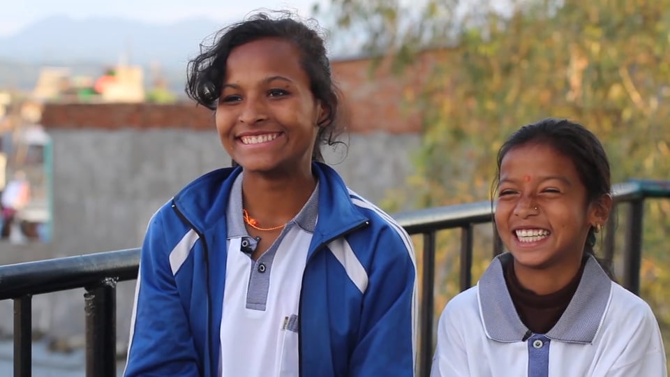Jharana and Sirjana from Nepal pose for picture outside