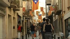 Critiques a les senyeres i estelades del Carrer del Port