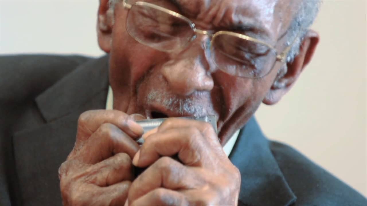 Elder Roma Wilson, gospel harmonica virtuoso, still playing and singing