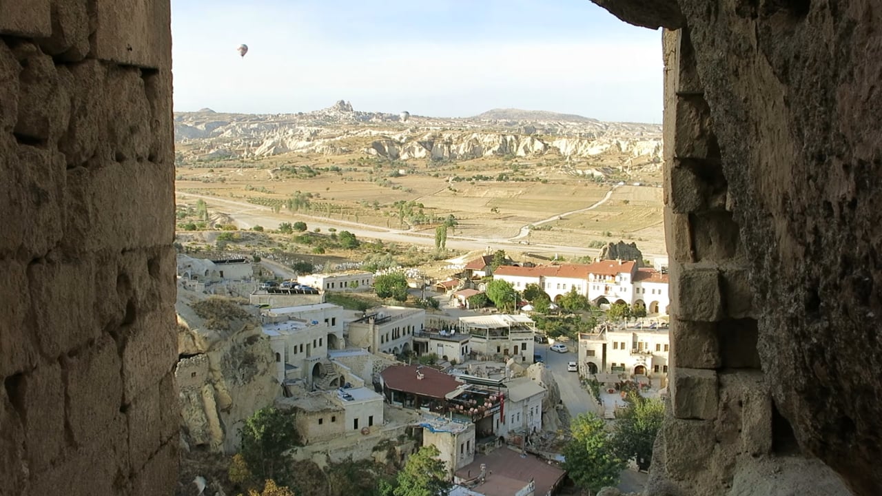 Wlcoming sunrise in Cavusin Turkey in an ancient cave dwelling