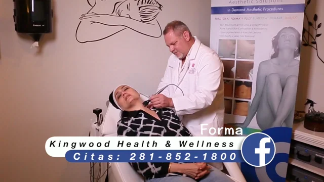 Robert Morgan APRN of Kingwood Health Wellness demonstrates the Forma skin tightening