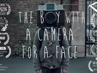 The Boy with a Camera for a Face