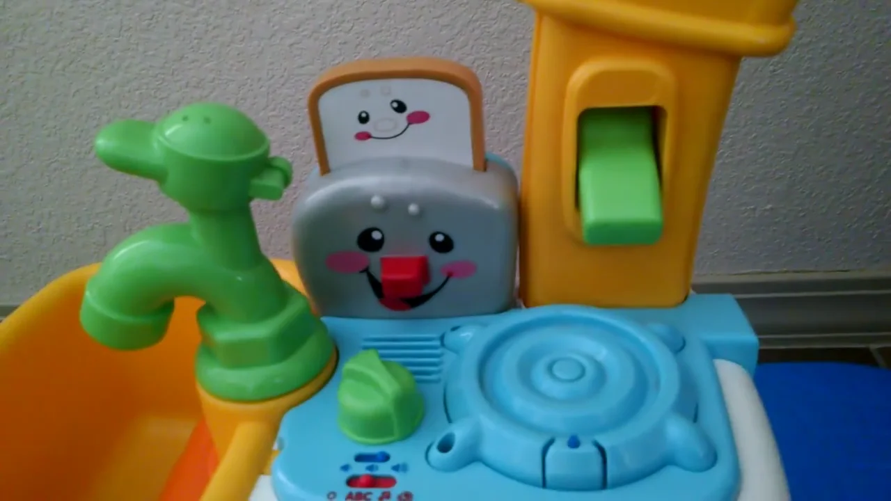 Fisher price laugh store and learning kitchen