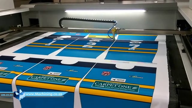 Machining Video: Printed Clothing Fabric Contour Cutting by Conveyor Table CNC Laser Cutter with CCD Camera