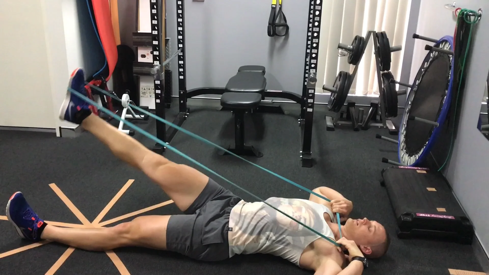 Prone hip extension with resistance band — Sydney Health Physiotherapy