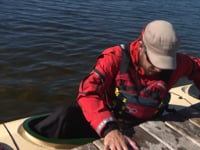 Launching A Kayak From A Dock