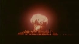Video still of a mushroom cloud from a nuclear explosion
