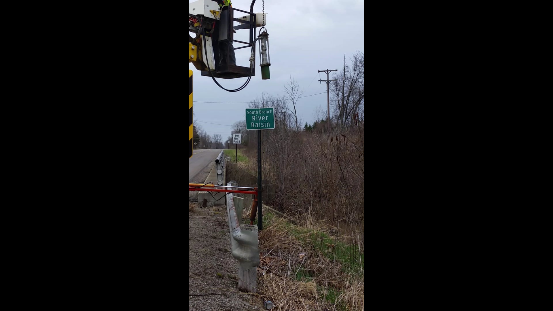 River Raisin Road Crossing Sign Installation by Lenawee County Road Commission