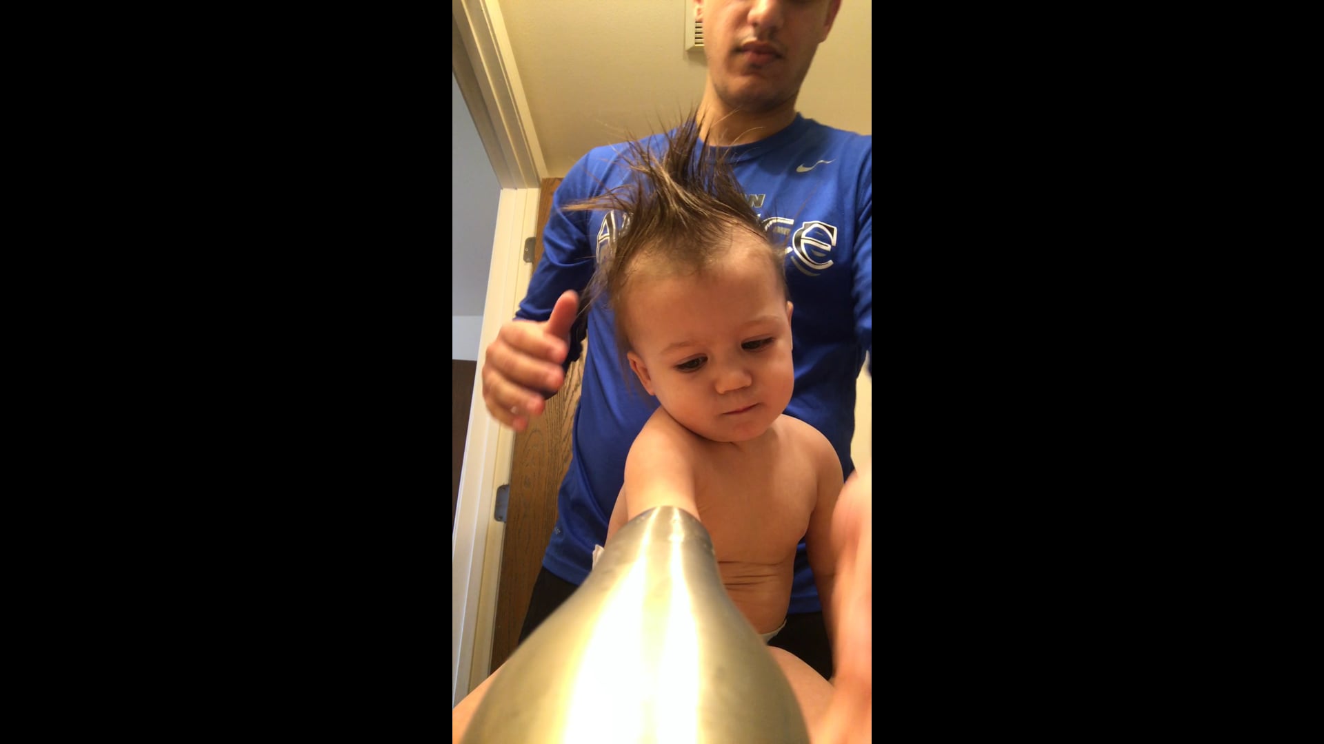 Learning to do hair.