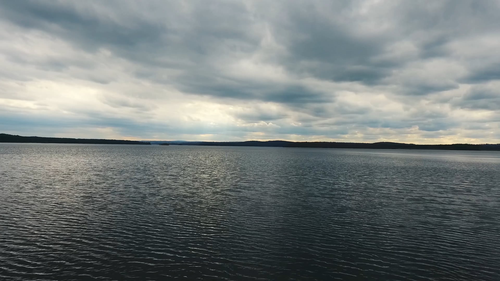 AERIAL: LAKE WITH CLOUDS