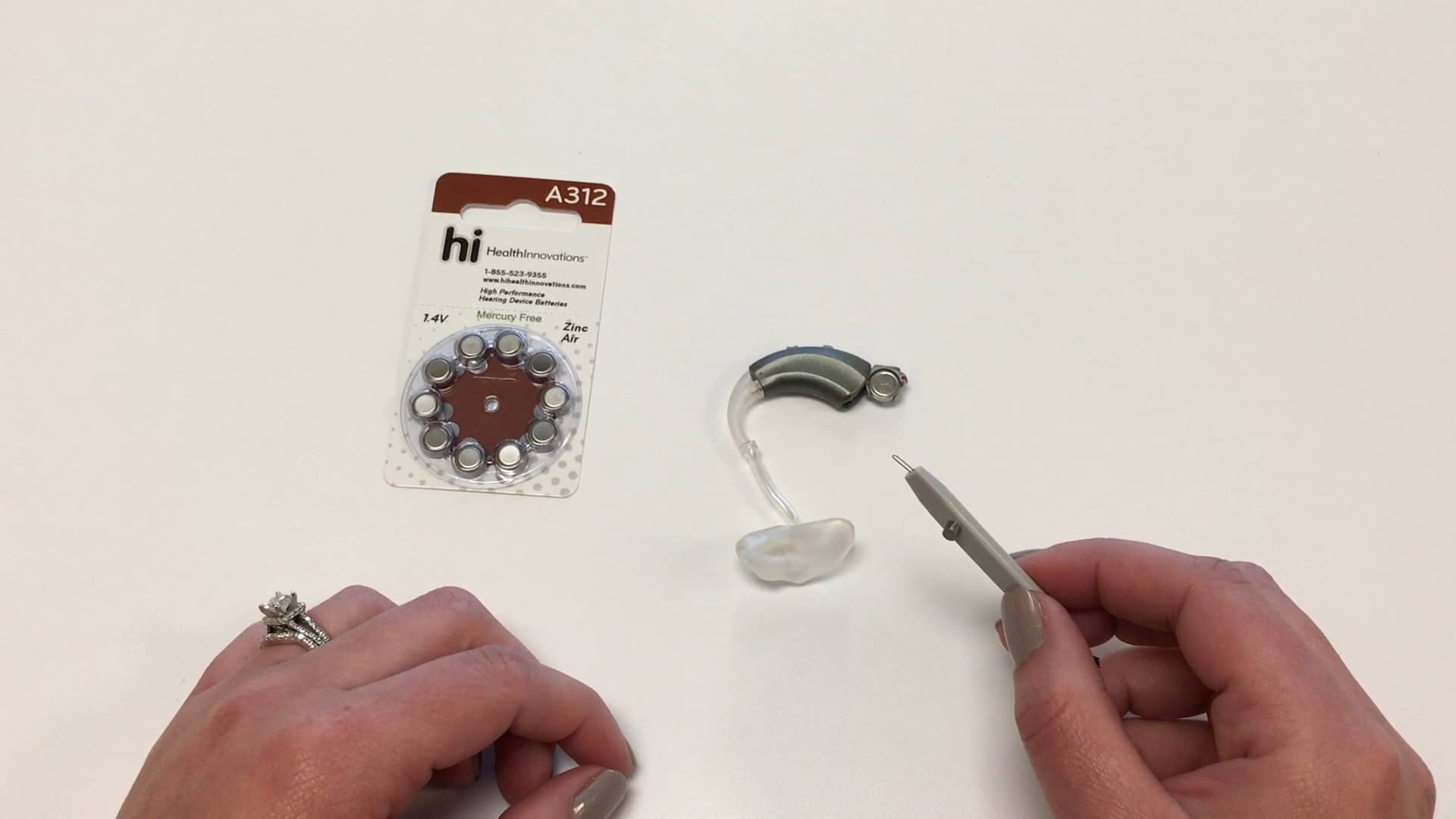 How to Use the Hearing Aid Battery Replacement Tool on Vimeo