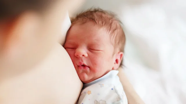 Baby sleeping while store breastfeeding