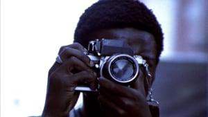 Buscapé fotografiando en Ciudad de Dios