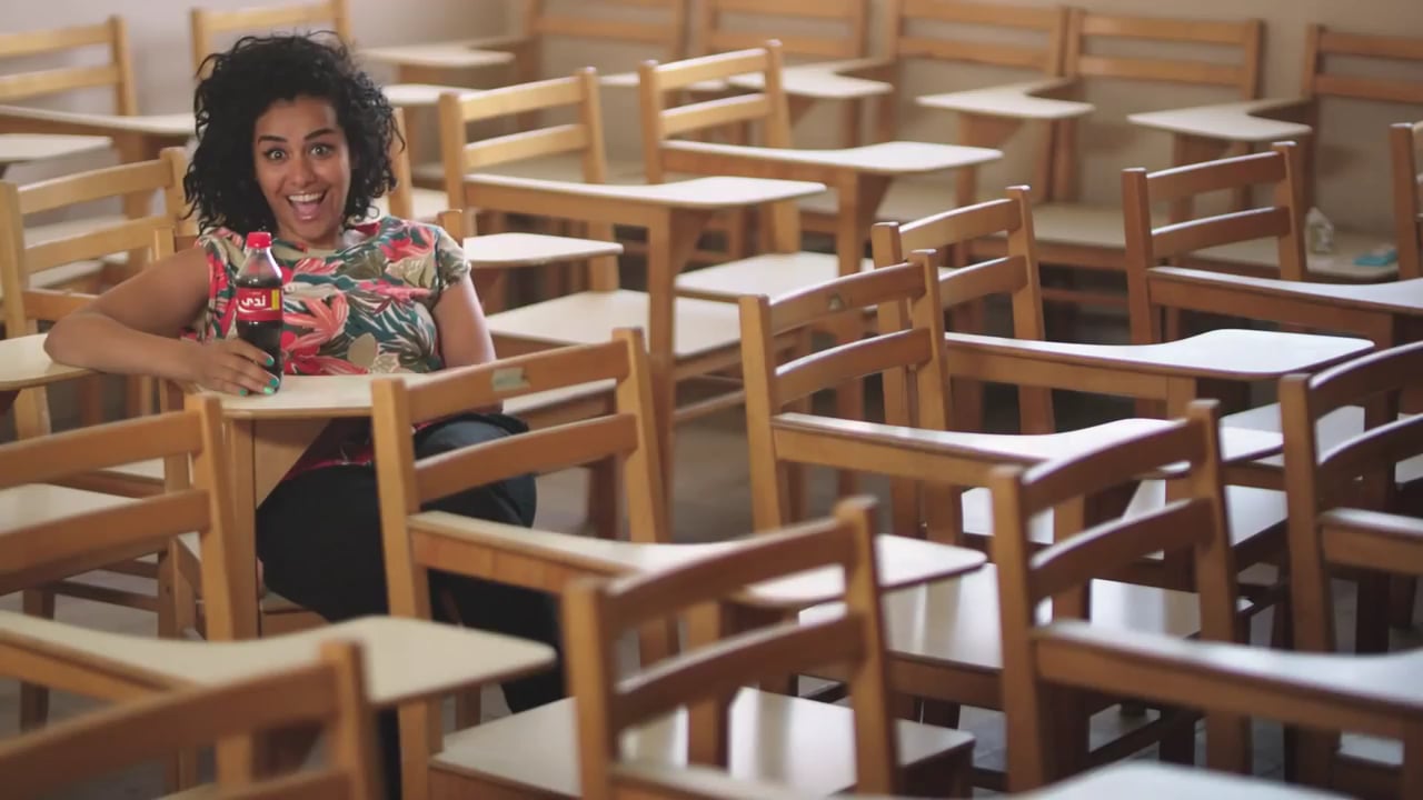 A girl in an empty classroom