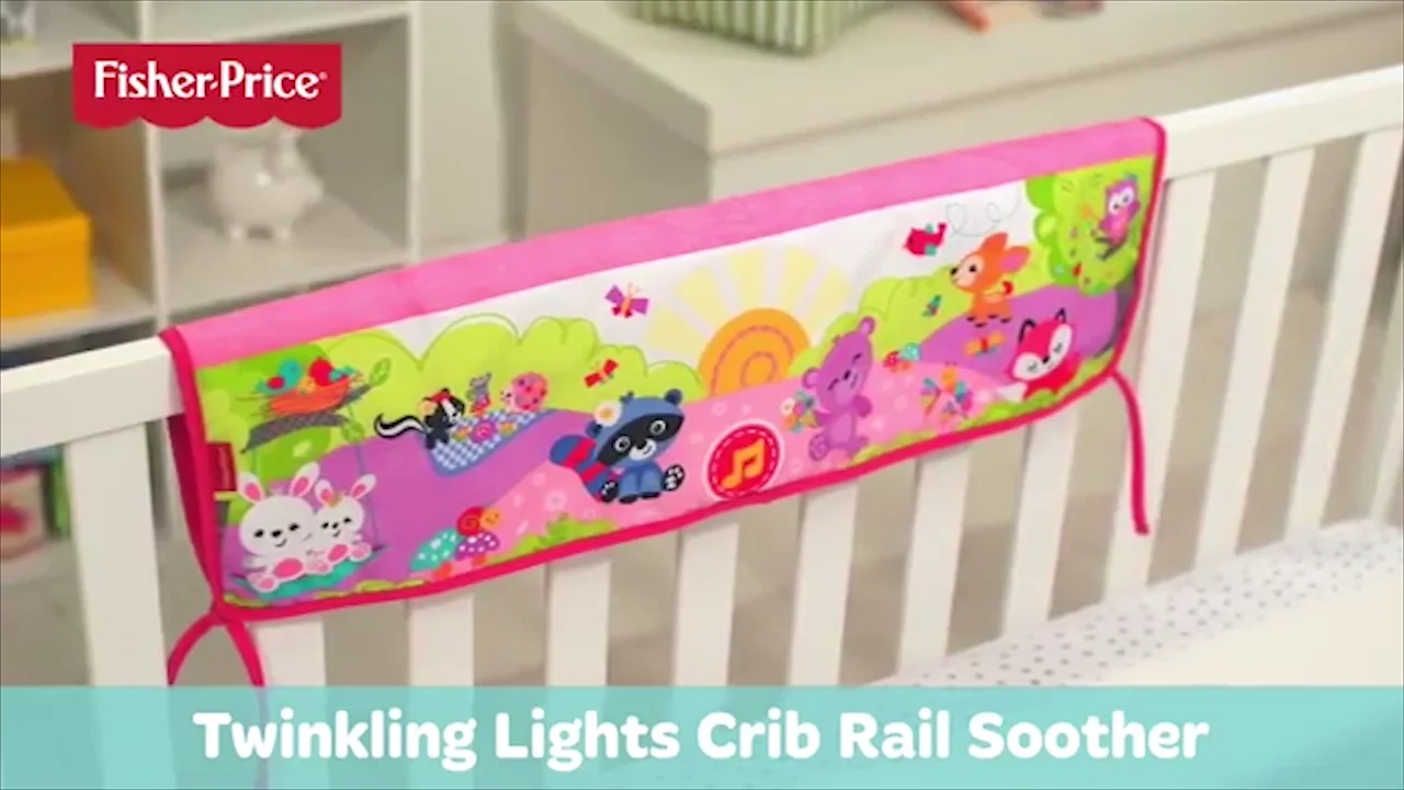 Fisher price twinkling lights crib store rail soother