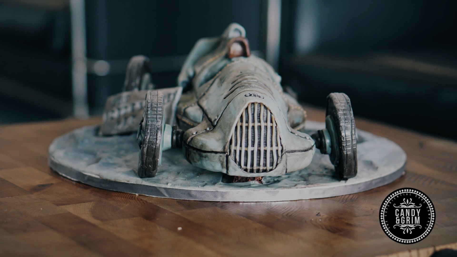 'Audi Silver Arrow' vintage racing car, projection mapped cake sculpture (rocky-road)