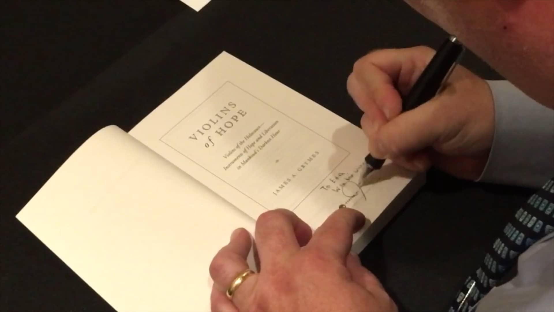 Author James Grymes prepares Birmingham for Violins of Hope exhibit