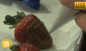 Chocolatiere Helping Us Make Chocolate Covered Strawberry Footballs