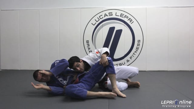 Rolling Back Take to Double Lapel Choke Against a Turtled Opponent